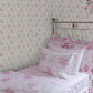 Ikat Rose Tinted Petals Small Print Wallpaper