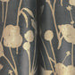 Shimmering Poppies Black & Gold Wallpaper